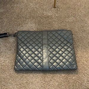 Oliver Thomas gun metal color.